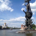 Large statue on an island under a blue sky