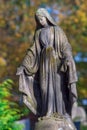 A large statue of Jesus ` mother.