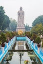 Large statue of standing Buddha in WAT THAI Temple, Sarnath city near Varanasi, India