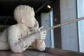 Large statue of young boy fishing off side of canal boat during life along the Eerie Canal, Syracuse, New York, 2017 Royalty Free Stock Photo