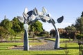 Large steel Sculpture named Entwined with copper patina by Chris Moore in Auckland Botanical Gardens Royalty Free Stock Photo