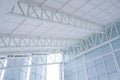 Large steel structure truss, roof frame and metal sheet in the building construction site Royalty Free Stock Photo
