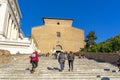 large and steep exterior staircase leading to the Basilica of Santa Maria in Aracoeli in Rome.