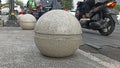 large stone ball on the sidewalk in Titik Nol Kilometer area of ??Yogyakarta City