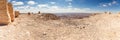 Large stone blocks chaotically standing in a park of stones in the Judean Desert near the city of Mitzpe Ramon in Israel