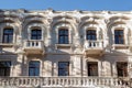 A large stone building with many windows Royalty Free Stock Photo