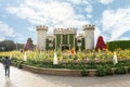 Large stone decorative medieval fortress on the territory on site of the botanical Dubai Miracle Garden in Dubai city, United Arab