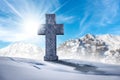 Large Stone Religious Cross in a Mountain Landscape with Snow Royalty Free Stock Photo