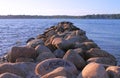 Large stones by the beach at sunset and lovers& x27; inscription on a stone