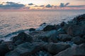 Large stones on the seashore during sunset Royalty Free Stock Photo