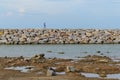 Large stones Was prepared in place of the sandy beach for the wave walls