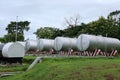 Large storage tanks for diesel and gasoline in outdoor stations.