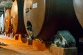 Large storage tanks where grape juice is aged into wine located in wine cellar Royalty Free Stock Photo