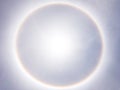 Large sun halo on the clear blue sky. Royalty Free Stock Photo