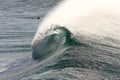 Large surf wave breaking with barrel view. Royalty Free Stock Photo