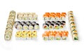 Large sushi rolls set for Japanese style party isolated on white Royalty Free Stock Photo