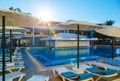 Large swimming pool with bar at european tropical hotel resort Royalty Free Stock Photo