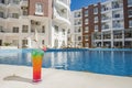 Large swimming pool with bar at a luxury tropical apartment resort Royalty Free Stock Photo