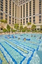 Large swimming pool with swimmers at Bellagio Casino in Las Vegas, NV
