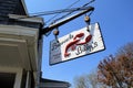 Large swinging sign advertising restaurant, Barnacle Billy`s, Perkins Cove, Maine, 2016