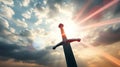 A large sword is depicted against a dramatic sky filled with clouds Royalty Free Stock Photo