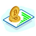 Large tablet top view with a graph of the growth of trades. De large gold volume coins of digital cryptocurrency bitcoin