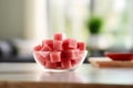 Large Tabletop with a Bowl of Watermelon Cubes. Generative AI Royalty Free Stock Photo