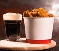 Large takeaway tub of fried chicken nuggets Royalty Free Stock Photo