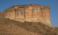 large tall cliff with sunlight on it Brandwag Buttress sandstone cliff Golden Gate Highlands National Park South Africa Royalty Free Stock Photo