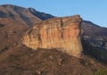 large tall cliff with sunlight on it Brandwag Buttress sandstone cliff Golden Gate Highlands National Park South Africa Royalty Free Stock Photo
