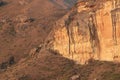 large tall cliff with sunlight on it Brandwag Buttress sandstone cliff Golden Gate Highlands National Park South Africa Royalty Free Stock Photo