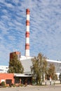 Large, Tall Electricity Thermal Power Plant Red, White Color Chimney Building Factory