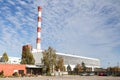 Large, Tall Electricity Thermal Power Plant Red, White Color Chimney Building Factory