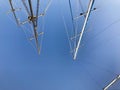 Large tall masts, a vertically standing structure on a ship, a ship supported by braces, guys, a part of sailing equipment on yach Royalty Free Stock Photo