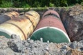 Large tank for gasoline in the excavated quarry for storage of petroleum products Royalty Free Stock Photo