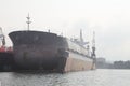 A large tanker ship is being repair in shipyard Poland