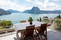 Large terrace overlooking the lake of Lugano on a summer day Royalty Free Stock Photo