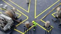 Large thick rope being hoisted across ship deck