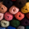 The large threads for yarn of different colors are folded together