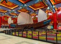 A large three-masted Chinese vessel - junk stands in the Chinese hall of the Ibn Battuta Mall shopping center in Dubai city,