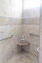 A large tiled handicap accessible shower with handrails Royalty Free Stock Photo