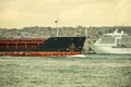 large tonnage ships navigating the strait.. of the Bosphorus, in the background