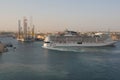 Valletta, Malta, August 2019. A huge ocean ferry unfolds at Grand Harbor.