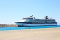 large tourist cruise liner moored seaport sunny Royalty Free Stock Photo