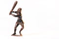 Large toy figures of primitive people on a white background Royalty Free Stock Photo