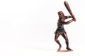 Large toy figures of primitive people on a white background