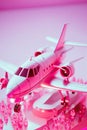 Large toy pink plane. Air travel concept. Girls\' holidays. Doll luxurious expensive lifestyle. Generative Ai