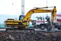 Large tracked excavator on a construction site. Royalty Free Stock Photo