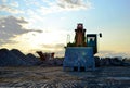 Large tracked excavator on a construction site.