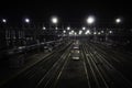 Large train station at night.